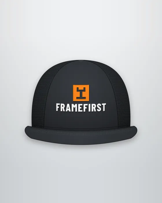 Charcoal FrameFirst hat with the orange logo patch.